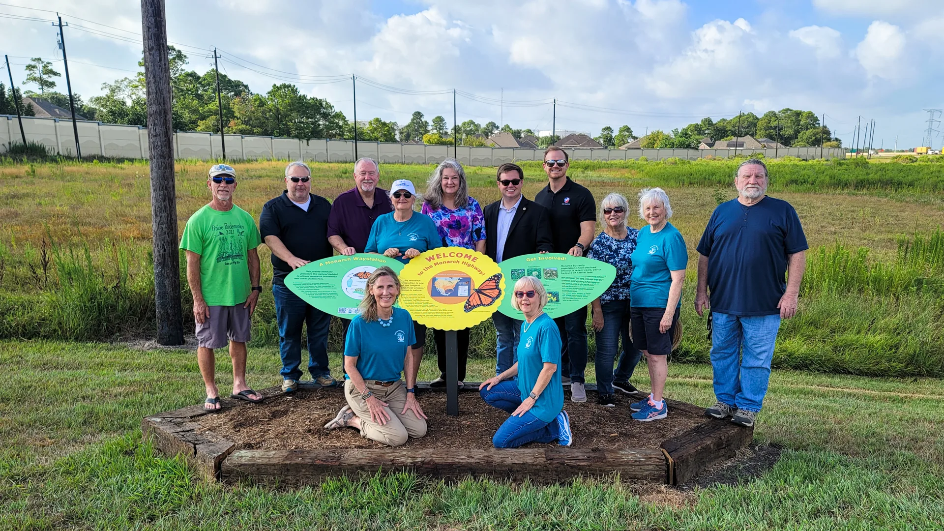 Officials and members at the Monarch Waystation unveiling ceremony